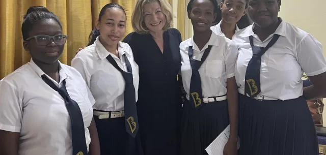 Laura Trevelyan with female students from Grenada